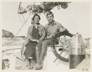 Image of Miriam and Himoe sitting on the wheel box of the Bowdoin